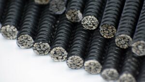 Thermoplastic composite hemp rebar produced through rapid pultrusion, showcasing its lightweight and sustainable properties.