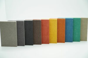Close-up of a Valchromat wood panel showcasing its vibrant color and smooth surface texture.